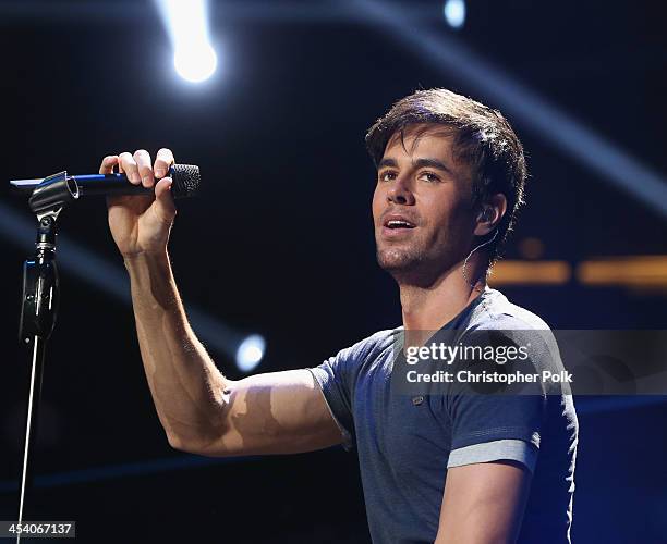 Recording artist Enrique Iglesias performs onstage during KIIS FMs Jingle Ball 2013 at Staples Center on December 6, 2013 in Los Angeles, CA.