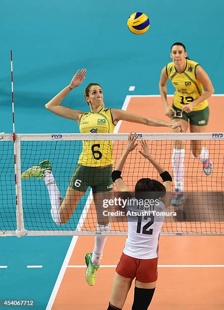 Thaisa Menezes of Brazil spikes the ball during the FIVB World Grand Prix Final group one match between Brazil and Japan on August 24, 2014 in Tokyo,...