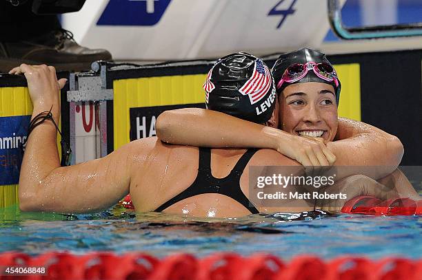 Maya Dirado of the United States celebrates winning the Women's 200m Individual Medley Final with Caitlin Leverenz of the United States during day...