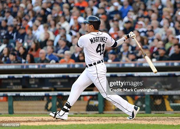 Victor Martinez of the Detroit Tigers bats during Game Four of the American League Division Series against the Oakland Athletics at Comerica Park on...