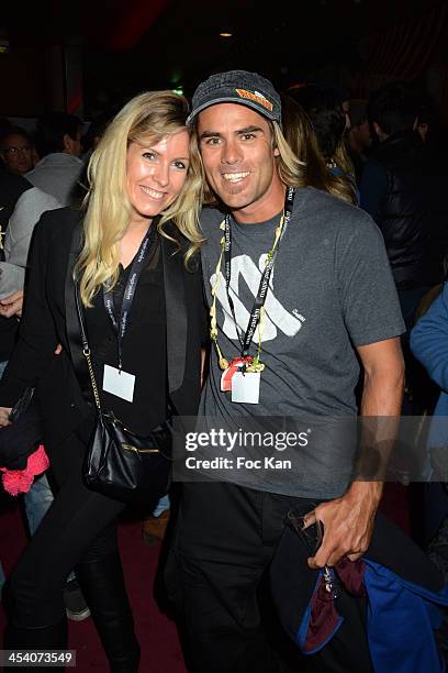 Anne Olivia Berthet and Surf champion Ueli Kestenholz attend the 'Nuit de La Glisse 2013' At Le Grand Rex on December 6, 2013 in Paris, France.