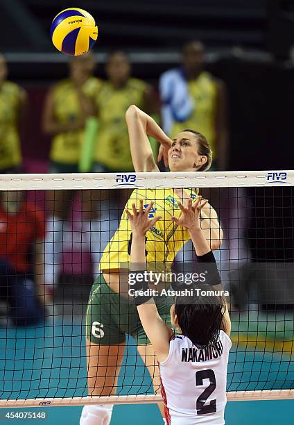 Thaisa Menezes of Brazil spikes the ball during the FIVB World Grand Prix Final group one match between Brazil and Japan on August 24, 2014 in Tokyo,...