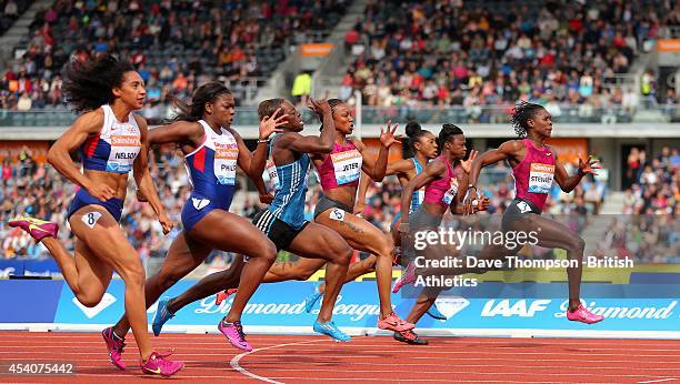 Kerron Stewart of Jamaica, right, wins the women's 100metres during the Sainsbury's Birmingham Grand Prix - Diamond League at the Alexander Stadium...