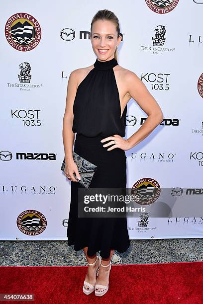 Actress AJ Cook attends the Festival of Arts Celebrity Benefit Concert and Pageant on August 23, 2014 in Laguna Beach, California.