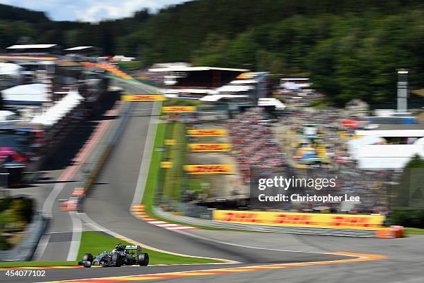 Lewis Hamilton of Great Britain and Mercedes GP drives around Eau Rouge during the Belgium Grand Prix at Circuit de Spa-Francorchamps on August 24,...