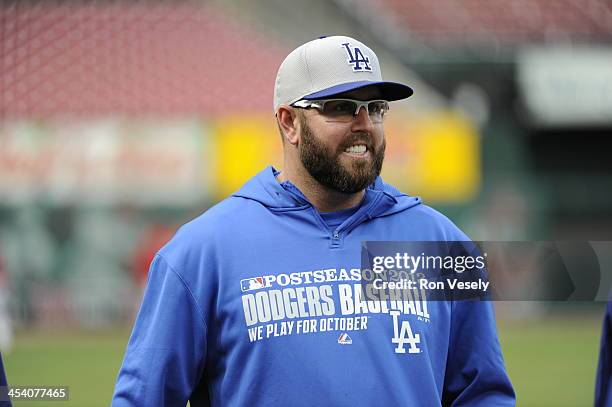 Member of the Los Angeles Dodgers looks on during batting practice prior to Game Six of the National League Championship Series against the St. Louis...