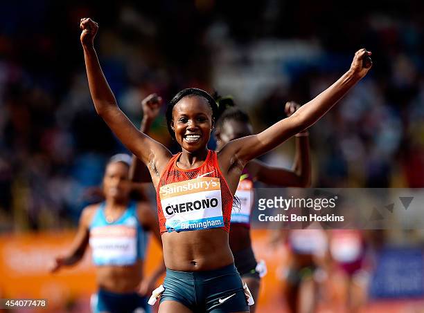 Mercy Cherono of Kenya celebrates winning the Women's 2 mile during the Diamond League at Alexander Stadium on August 24, 2014 in Birmingham, England.