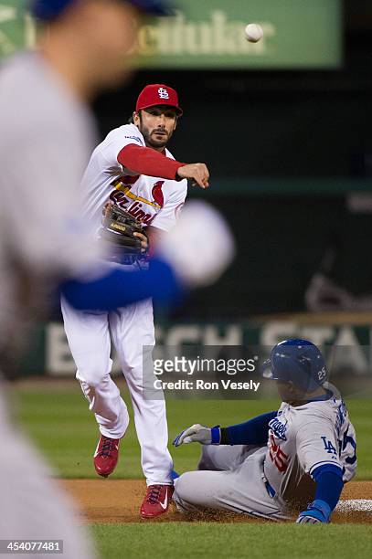 Matt Carpenter of the St. Louis Cardinals makes a play at second base during Game Six of the National League Championship Series against the Los...