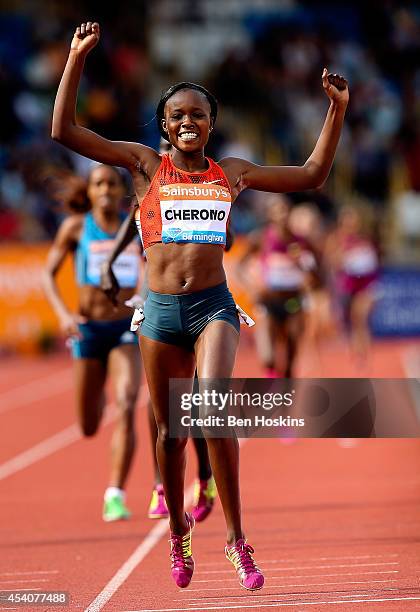 Mercy Cherono of Kenya celebrates winning the Women's 2 mile during the Diamond League at Alexander Stadium on August 24, 2014 in Birmingham, England.