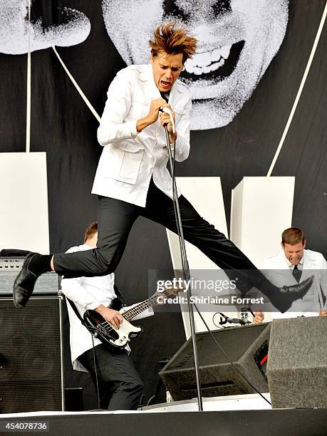 Howlin' Pelle Almqvist of The Hives performs on Day 3 of the Leeds Festival at Bramham Park on August 24, 2014 in Leeds, England.