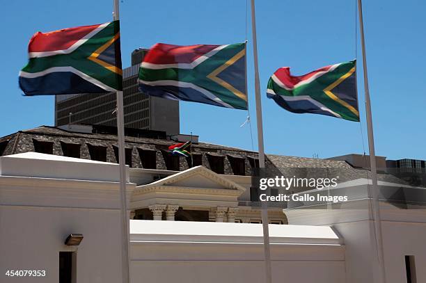 Flags seen at Parliament in Cape Town on December 6 in Cape Town, South Africa. The Nation's Father, Nelson Mandla, passed away in a peaceful slumber...