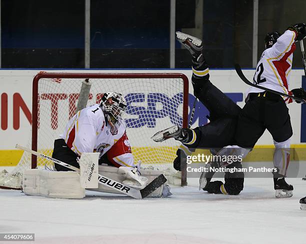 Brandon Benedict of Nottingham Panthers is fouled by a Lulea player during the Champions Hockey League group stage game between Nottingham Panthers...