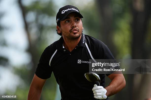 Jason Day of Australia reacts to his shot from the 6th tee during the final round of The Barclays at The Ridgewood Country Club on August 24, 2014 in...