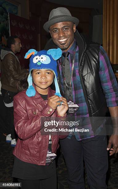 Maile Masako Brady and Wayne Brady attend the Jingle Ball Backstage Gifting Suite sponsored by Flips Audio at Staples Center on December 6, 2013 in...