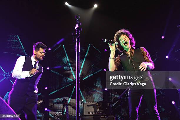 Dtaco Rosa performs with Bunbury at Draco & Friends Concert at Coliseo de Puerto Rico on December 6, 2013 in San Juan, Puerto Rico.