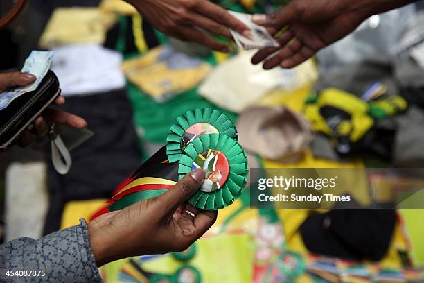 People gathering in Vilakazi street on December 6 in Johannesburg, South Africa. The Father of the Nation, Nelson Mandela, Tata Madiba, passed away...