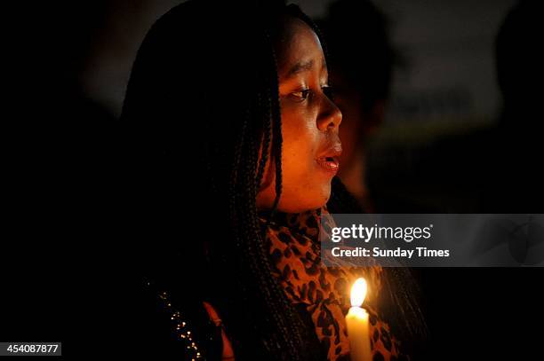 People gathering in Vilakazi street on December 6 in Johannesburg, South Africa. The Father of the Nation, Nelson Mandela, Tata Madiba, passed away...