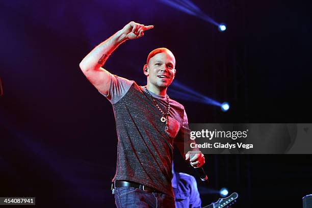 Rene of Calle 13 performs with Draco Rosa at Draco & Friends Concert at Coliseo de Puerto Rico on December 6, 2013 in San Juan, Puerto Rico.