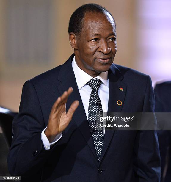 Burkina Faso's President Blaise Compaore arrives for a dinner with the French President as part of the Summit for Peace and Security in Africa at the...