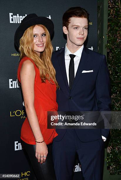 Actress Bella Thorne and actor Cameron Monaghan arrive at the 2014 Entertainment Weekly Pre-Emmy Party at Fig & Olive Melrose Place on August 23,...