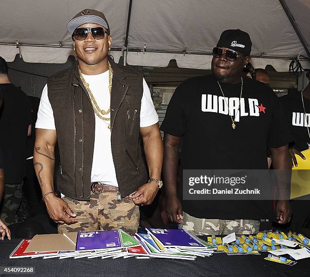 Cool J and WorldStarHipHop CEO Lee O'Denat attend the 2nd Annual Worldstar Foundation Back To School Giveaway at Jamaica Colosseum Mall on August 24,...