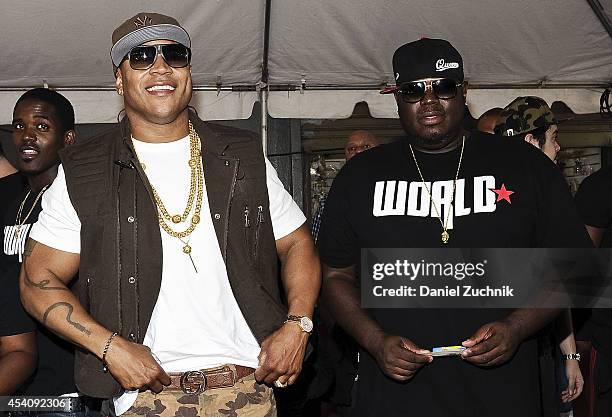 Cool J and WorldStarHipHop CEO Lee O'Denat attend the 2nd Annual Worldstar Foundation Back To School Giveaway at Jamaica Colosseum Mall on August 24,...