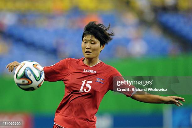 Jo Ryon Hwa of Korea DPR runs with the ball during the FIFA Women's U-20 3rd place game against France at Olympic Stadium on August 24, 2014 in...