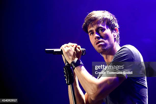 Singer Enrique Iglesias performs onstage during KIIS FMs Jingle Ball 2013 at Staples Center on December 6, 2013 in Los Angeles, California.