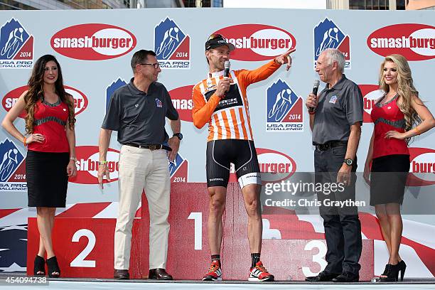 From left, Paul Sherwen, Jens Voigt of Germany riding for Trek Factory Racing in the orange most courageous rider jersey and Phil Liggett talk on the...