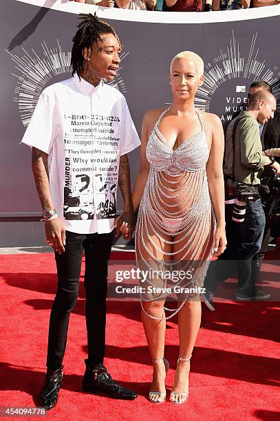 Recording artist Wiz Khalifa and model Amber Rose attend the 2014 MTV Video Music Awards at The Forum on August 24, 2014 in Inglewood, California.