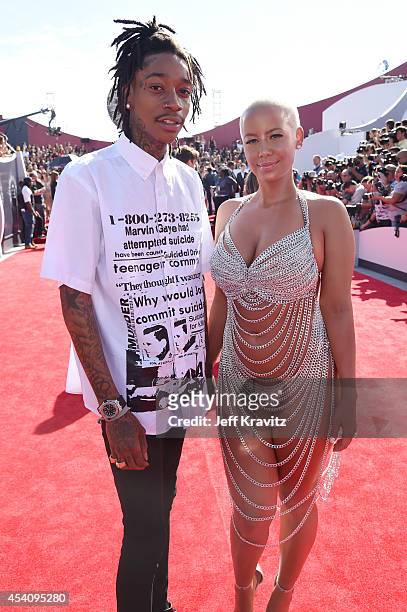 Recording artist Wiz Khalifa and model Amber Rose attend the 2014 MTV Video Music Awards at The Forum on August 24, 2014 in Inglewood, California.