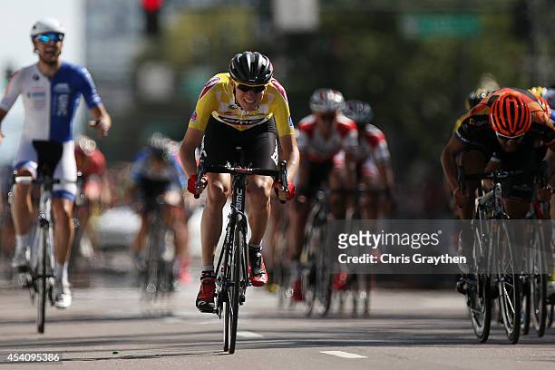 Tejay van Garderen of the United States riding for the BMC Racing Team in the yellow leader's jersey sprints to the finish line at the end of the...
