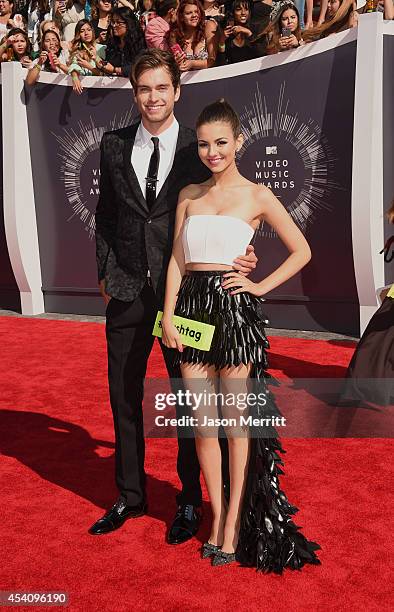 Actors Pierson Fode and Victoria Justice attend the 2014 MTV Video Music Awards at The Forum on August 24, 2014 in Inglewood, California.