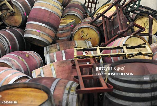 Barrels are strewn about inside the storage room of Bouchaine Vineyards in Napa in downtown Napa, California after an earthquake struck the area....