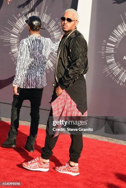 Recording artists Tyga and Chris Brown attend the 2014 MTV Video Music Awards at The Forum on August 24, 2014 in Inglewood, California.