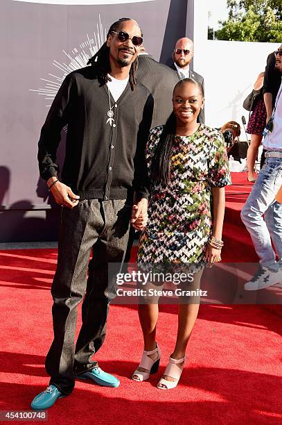 Recording artist Snoop Dogg and Cori Broadus attend the 2014 MTV Video Music Awards at The Forum on August 24, 2014 in Inglewood, California.