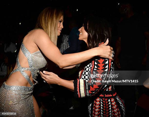 Jennifer Lopez and Kim Kardashian attend the 2014 MTV Video Music Awards at The Forum on August 24, 2014 in Inglewood, California.