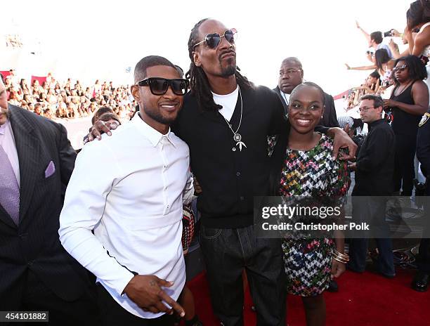 Recording artists Usher, Snoop Dogg and Cori Broadus attend the 2014 MTV Video Music Awards at The Forum on August 24, 2014 in Inglewood, California.