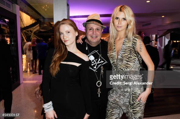 Julie Wynn, Edward Bass & Taylor McClur attend Niche Media Party Hosted By Zoe Saldana on December 6, 2013 in Miami Beach, Florida.