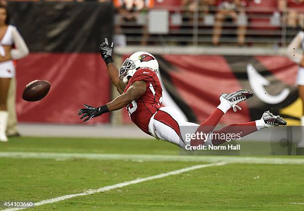 Cornerback Jerraud Powers of the Arizona Cardinals can't snare a pass during a NFL preseason game against the Cincinnati Bengals at University of...