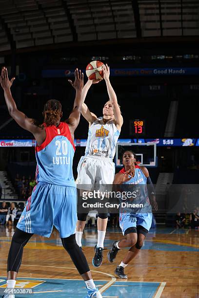 Allie Quigley of the Chicago Sky shoots the ball against Sancho Lyttle of the Atlanta Dream as Tiffany Hayes of the Dream watches in Game Two of the...