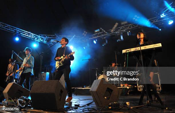 Kip Berman, Kurt Feldman, Alex Naidus, Connor Hanwick and Peggy Wang of The Pains of Being Pure at Heart perform on stage at the Reading Festival at...