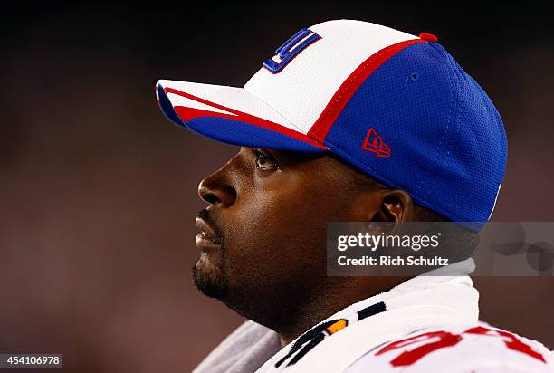 Mathias Kiwanuka of the New York Giants on the sidelines during a game against against the New York Jets at MetLife Stadium on August 22, 2014 in...