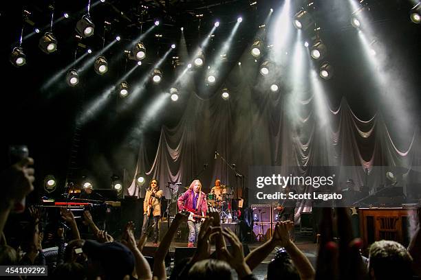 Tom Petty and the Heartbreakers perform at DTE Energy Music Theater on August 24, 2014 in Clarkston, Michigan.