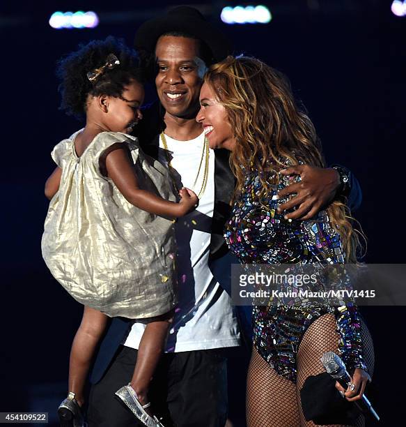 Blue Ivy Carter, Jay Z and Beyonce onstage during the 2014 MTV Video Music Awards at The Forum on August 24, 2014 in Inglewood, California.