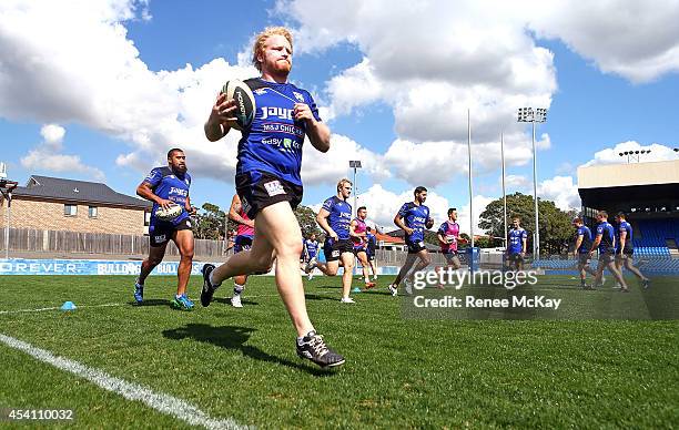 James Graham warms up during a Canterbury Bulldogs NRL training session at Belmore Sports Ground on August 25, 2014 in Sydney, Australia.