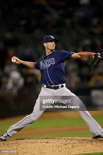 Grant Balfour of the Tampa Bay Rays pitches during the game against the Oakland Athletics at O.co Coliseum on August 4, 2014 in Oakland, California....