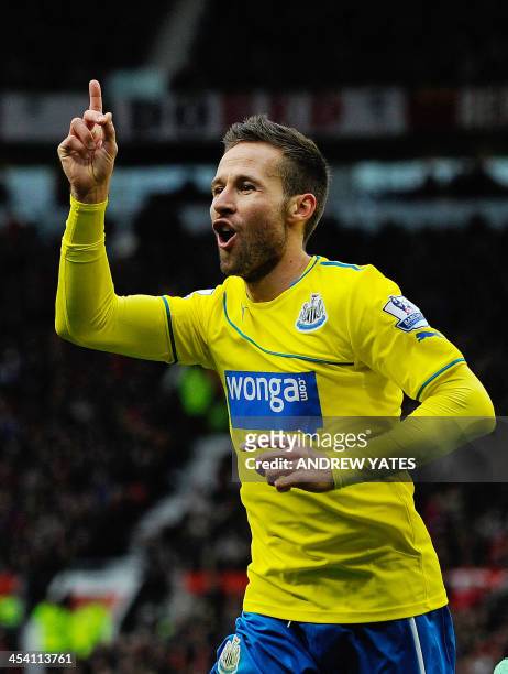 Newcastle United's French midfielder Yohan Cabaye celebrates scoring the opening goal during the English Premier League football match between...