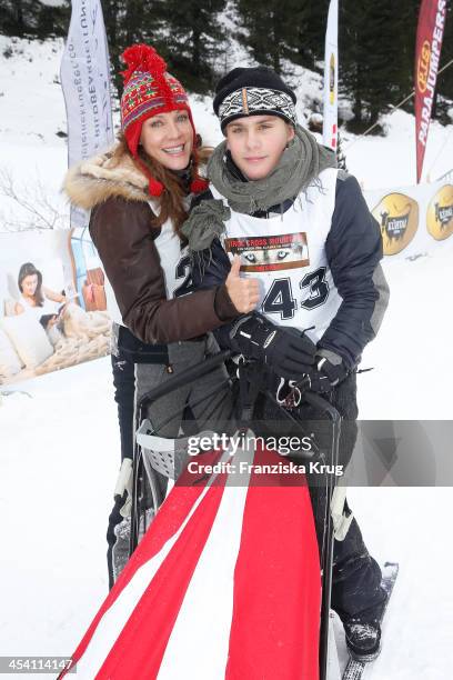 Sonja Kirchberger and Lee-Oscar Kirchberger attend the Sledge Dog Race - Tirol Cross Mountain 2013 on December 07, 2013 in Innsbruck, Austria.