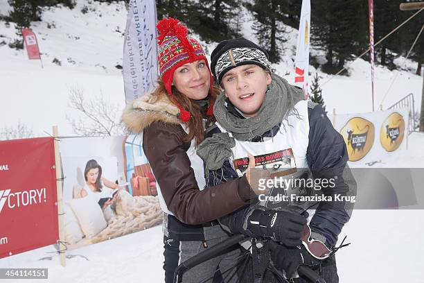 Sonja Kirchberger and Lee-Oscar Kirchberger attend the Sledge Dog Race - Tirol Cross Mountain 2013 on December 07, 2013 in Innsbruck, Austria.